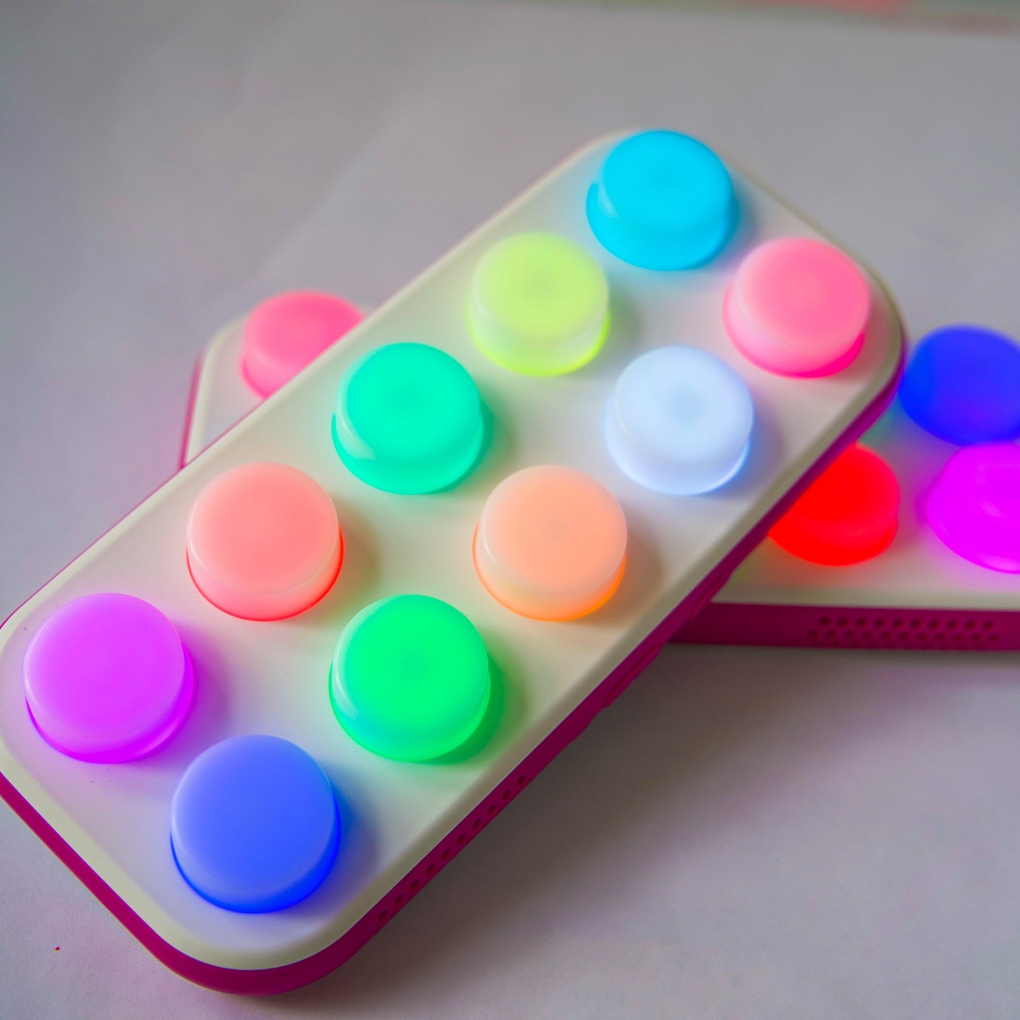 Two Colorful Boppo toys on a light background