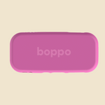 A pink protective sleeve with rounded corners and the brand name 'boppo' printed in the center, shown on a solid light beige background.