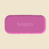 A pink protective sleeve with rounded corners and the brand name 'boppo' printed in the center, shown on a solid light beige background.