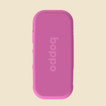 A pink rectangular  case with rounded corners and the brand name 'boppo' printed vertically in a lighter pink on the back, shown against a solid light beige background.
