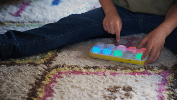 A gif of a boy playing Memory on Boppo