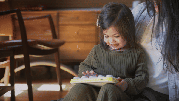 Gif of child playing music on Boppo