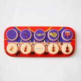 Colorful toy with musical instrument icons on a white background