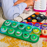 Colorful toy with animal illustrations on a carpeted floor
